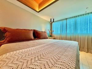 Ένα ή περισσότερα κρεβάτια σε δωμάτιο στο Mercure Maceio Pajuçara