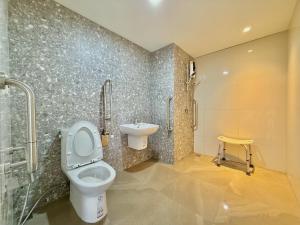 Koupelna v ubytování Rangsit Residence & Hotel + 3 fotografie