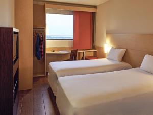 Кровать или кровати в номере Ibis Cancun Centro