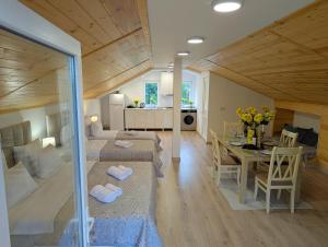 a living room and dining room in a house at Bodokia winery and guesthouse in Gegut'i +27 photos