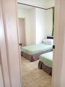 Postel nebo postele na pokoji v ubytování Costa Mahkota Two Bedroom MuslimOnly