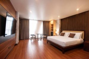 Postel nebo postele na pokoji v ubytování NandB HOTEL