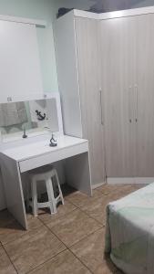 Ένα μπάνιο στο Sinta-se em casa