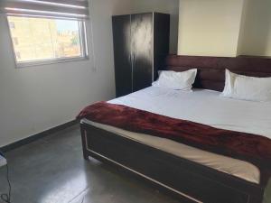 Giường trong phòng chung tại Hotel O H Pass