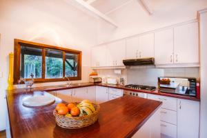 a kitchen with a basket of fruit on a counter at Thornwood in KwaNibela