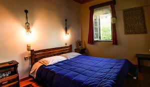 Postel nebo postele na pokoji v ubytování To Rodi + 18 fotografií