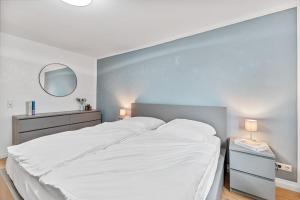 Ένα ή περισσότερα κρεβάτια σε δωμάτιο στο Work & Stay - Apartment mit Office