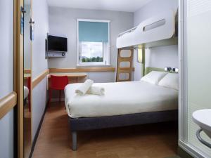 Кровать или кровати в номере ibis budget Hotel Edinburgh Park