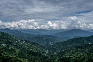 a view of a valley with mountains in the distance at Friendship Lane in Sater
