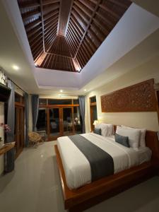 Postel nebo postele na pokoji v ubytování Jambangan bali ubud + 69 fotografií