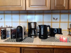 a kitchen counter with various appliances on a counter top at Gigi's House in Colico