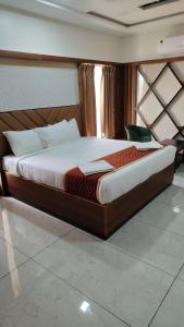 Ένα ή περισσότερα κρεβάτια σε δωμάτιο στο Joy Vista Resort