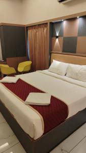 Ένα ή περισσότερα κρεβάτια σε δωμάτιο στο Joy Vista Resort +8 φωτογραφίες