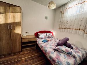 Postel nebo postele na pokoji v ubytování Plava Špilja-ID