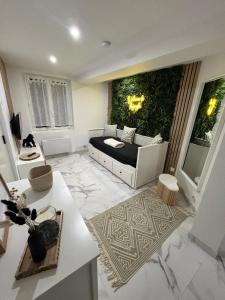 Posezení v ubytování Jungle house,Arr autonome,Proche Aéroport & Gare