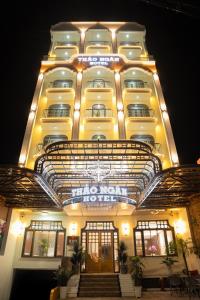 a large building with a sign on it at Thảo Ngân Pleiku Hotel in Plei Khưn