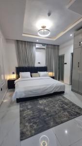 Postel nebo postele na pokoji v ubytování Demos Premium Apartments and Suites