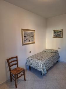 Postel nebo postele na pokoji v ubytování CasaRico