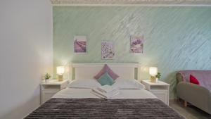 Postel nebo postele na pokoji v ubytování Vila Suveranii