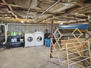 a laundry room with a washer and dryer at Sea Esta in Wells