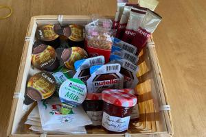 a crate filled with food and other food items at Caravan - Sleeps 4 - Pet friendly - Parking in Newton Stewart