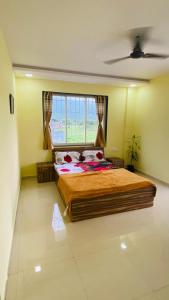 Katil atau katil-katil dalam bilik di ll EMPYREAN STAY ll SUPREME VILLA ll AC 3BHK II PRIVATE POOL