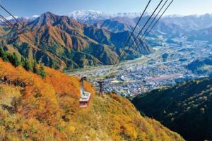 a gondola ride up a mountain in the fall at Sea Hale - Vacation STAY 7734 in Yuzawa