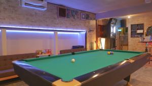 a living room with a pool table in a room at Sea Hale - Vacation STAY 7734 in Yuzawa