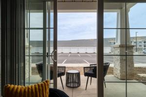 a room with a view of a parking lot at Lux Haven Whitestown in Whitestown