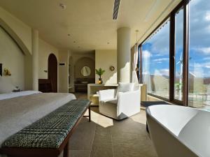 Un pat sau paturi într-o cameră la 栖悦风禾 QiYue FengHe Villa Resort
