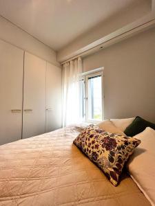 Postel nebo postele na pokoji v ubytování Uutuutta hohtava tyylikäs kolmio lähellä keskustaa