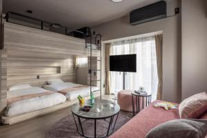 Ένα ή περισσότερα κρεβάτια σε δωμάτιο στο CLASS Shinagawa