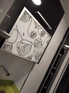 a drawing of roses on a wall at Casa Babu in Solares