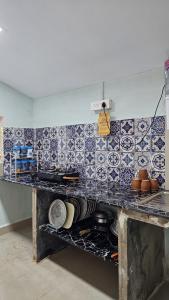 Η κουζίνα ή μικρή κουζίνα στο Homestay at Agonda by the backwaters