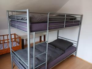 Μία ή περισσότερες κουκέτες σε δωμάτιο στο Silly Apartment