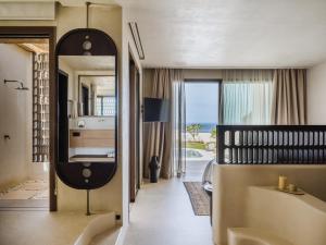 Ένα ή περισσότερα κρεβάτια σε δωμάτιο στο Serendi Villas +105 φωτογραφίες