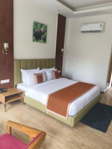 Postel nebo postele na pokoji v ubytování Creekwood Farmhouse Resort