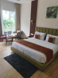 Postel nebo postele na pokoji v ubytování Creekwood Farmhouse Resort