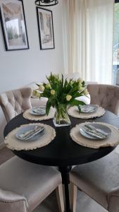 Photo de la galerie de l'établissement Domki nad jeziorami Niedźwiady, à Ślesin