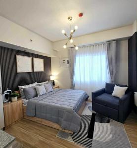 Postel nebo postele na pokoji v ubytování Cozy Condo in Holland Park Southwoods With Pool