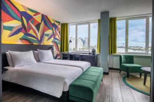 Postel nebo postele na pokoji v ubytování Thon Hotel Rotterdam City Centre