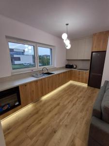 Η κουζίνα ή μικρή κουζίνα στο Mieszkania i Apartamenty
