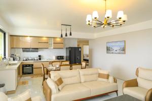 Kuchyň nebo kuchyňský kout v ubytování Park View Luxury Apartments