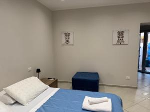 Ένα ή περισσότερα κρεβάτια σε δωμάτιο στο Rifugio Calabrese