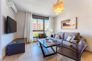 Μια τηλεόραση ή/και κέντρο ψυχαγωγίας στο PALM-MAR Paradise with pools and AC