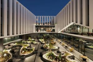 a rendering of the lobby of a planned hospital at Moxy Alfragide Lisboa in Alfragide