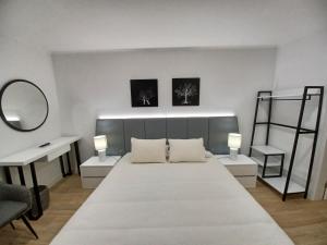 Ένα ή περισσότερα κρεβάτια σε δωμάτιο στο Basaltic's Rooms
