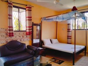 Postel nebo postele na pokoji v ubytování Zaradise Hotel