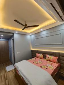 Postel nebo postele na pokoji v ubytování Anantya Inn