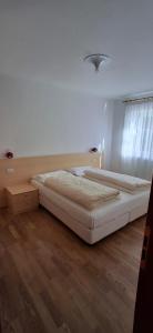 Ένα ή περισσότερα κρεβάτια σε δωμάτιο στο Chalet Decrestina